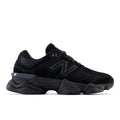 New Balance 9060 running shoes in dark black with blue accent, chunky sole