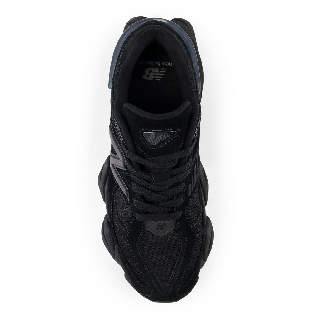 New Balance 9060 shoe heel view with laces and dark interior lining