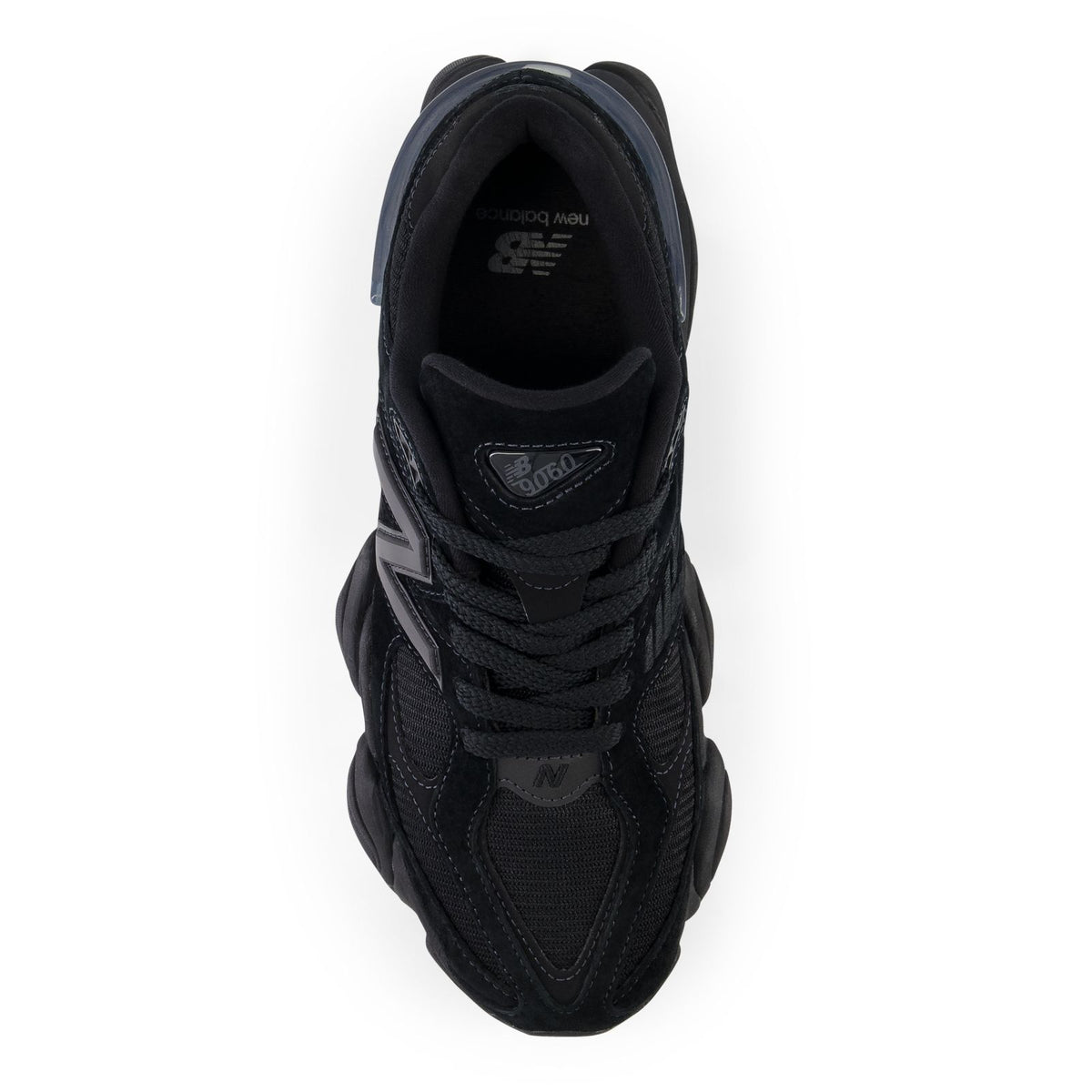 New Balance 9060 shoe heel view with laces and dark interior lining
