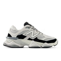 Unisex running shoes in white/black with gray laces and chunky cushioned sole