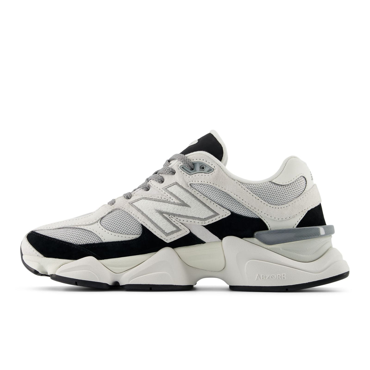 Unisex running shoes with white upper, black side panels, and light gray sole