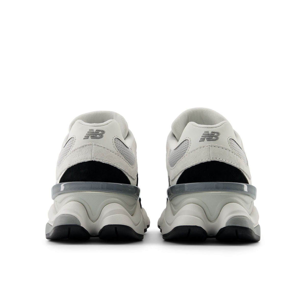 Unisex running shoes from heel view, white upper with black lining and gray sole